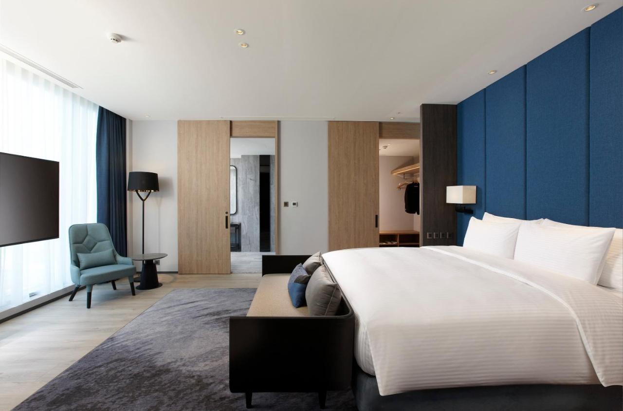 Cozzi Blu Otel Zhongli Dış mekan fotoğraf A bedroom at the hotel